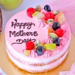 Fruity Delight For Mom, featuring a vibrant assortment of fresh fruits artfully arranged on a creamy base, ideal for Mother's Day.