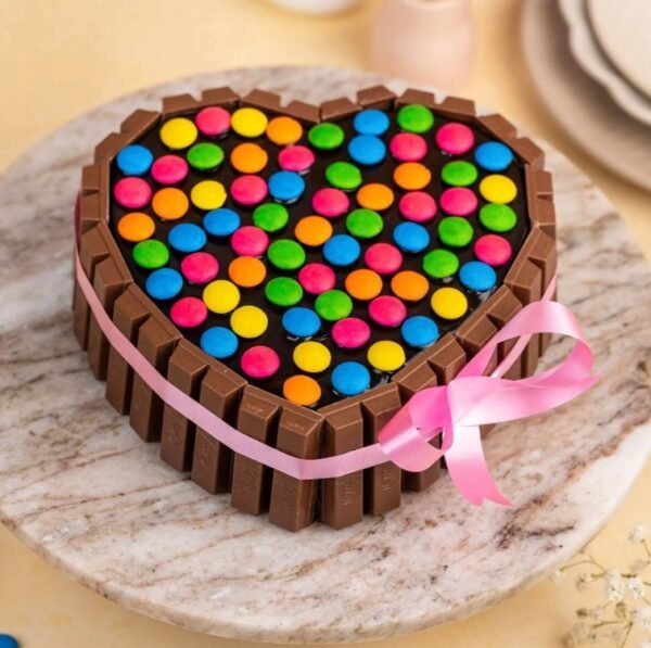 Colorful Gems KitKat Heart Cake with chocolate layers, topped with KitKat bars and vibrant gems, perfect for celebrations and special occasions.