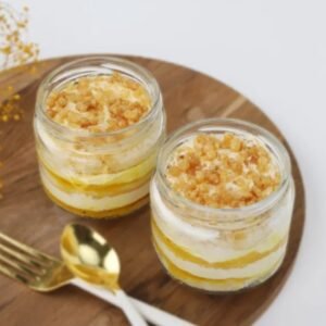 Golden Crunch Jar Duo - Two jars filled with layers of crunchy treats and creamy goodness, ideal for dessert lovers and indulgence.