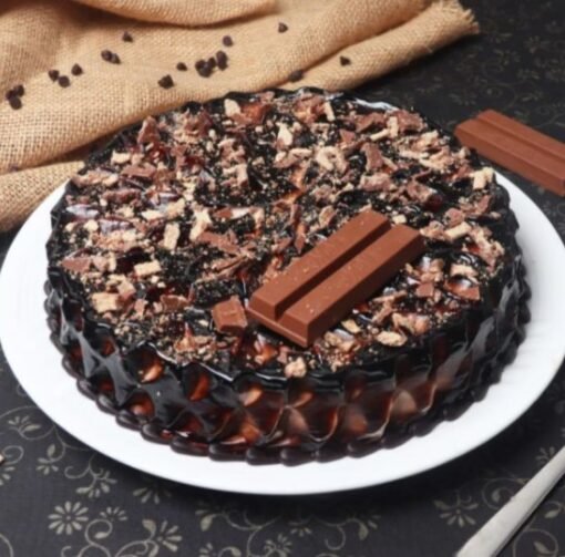 KitKat Lovers Special Cake with rich chocolate layers, topped with crispy KitKat bars, perfect for any celebration or dessert.