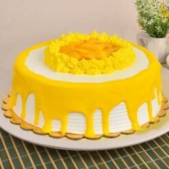 Delicious Creamy Layered Mango Cake with fresh mango slices and smooth cream layers, perfect for a tropical dessert experience.