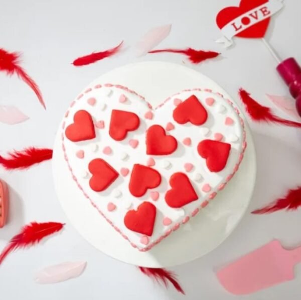 Love Heart Shaped Cake with rich flavors, elegantly decorated for romantic celebrations and special occasions, perfect for expressing love and affection.