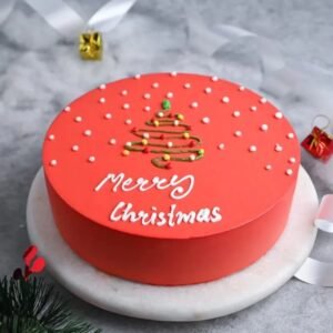 Merry Christmas Cake featuring festive decorations, including snowflakes and holly, ideal for holiday celebrations and family gatherings.