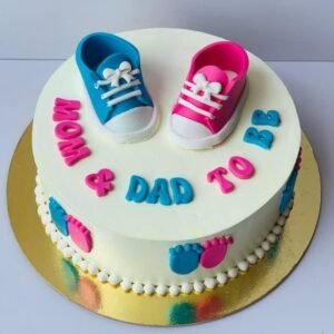 Mom and Dad To Be Cake adorned with charming decorations, perfect for celebrating the exciting arrival of a new baby.