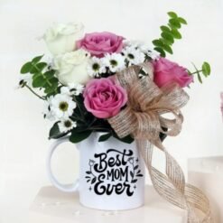 Mom’s Blooming Mug Celebration with fresh flowers in a decorative keepsake mug, ideal for celebrating mothers on Mother’s Day.