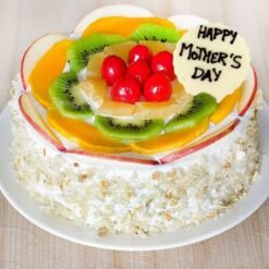 Mom's Fruity Delight Cake, featuring layers of fluffy cake topped with an assortment of fresh fruits, ideal for special occasions.