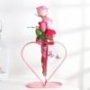 Mom’s Heart-Shaped Rose Planter featuring a beautiful arrangement of roses in a heart-shaped planter, ideal for celebrating and honoring mothers.