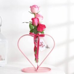 Mom’s Heart-Shaped Rose Planter featuring a beautiful arrangement of roses in a heart-shaped planter, ideal for celebrating and honoring mothers.