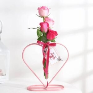 Mom’s Heart-Shaped Rose Planter featuring a beautiful arrangement of roses in a heart-shaped planter, ideal for celebrating and honoring mothers.