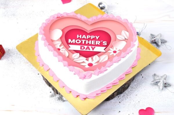 Mother's Day Creamy Heart Cake decorated with flowers and cream, symbolizing love and appreciation for mothers on their special day.