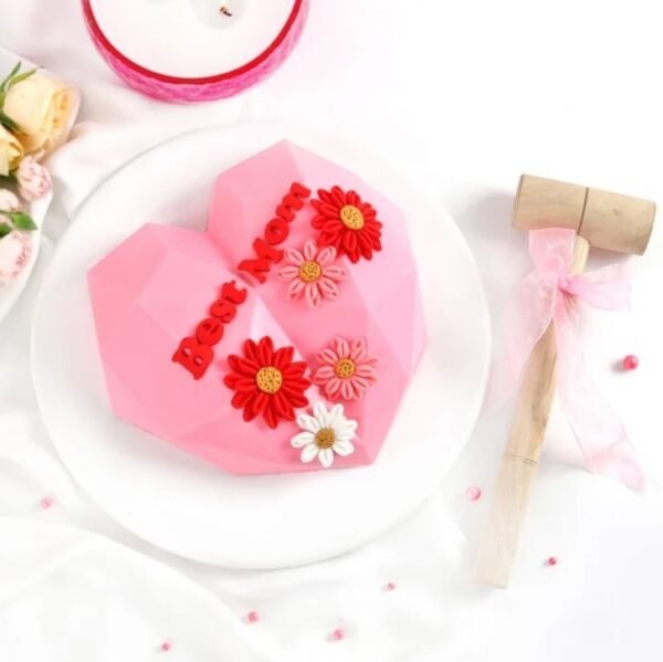 Mother’s Day Heart Pinata Cake filled with sweet surprises, perfect for celebrating and delighting moms on their special day.