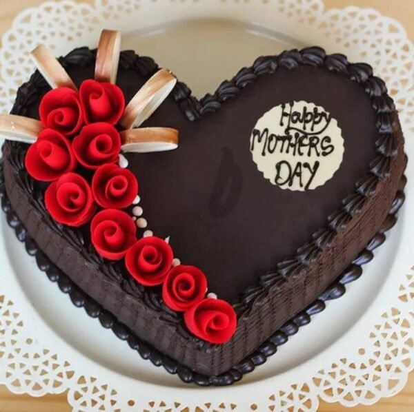 Mother's Day Truffle Heart Cake covered in smooth chocolate truffle, shaped like a heart, with elegant decorations for a special celebration.