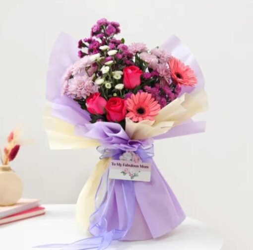 Perfectly Pink Petals for Mom featuring a stunning arrangement of pink flowers, perfect for celebrating and honoring mothers on special occasions.