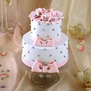 Charming Petal Pals Two-Tier Cake adorned with delicate floral designs, ideal for birthdays, weddings, and special celebrations.