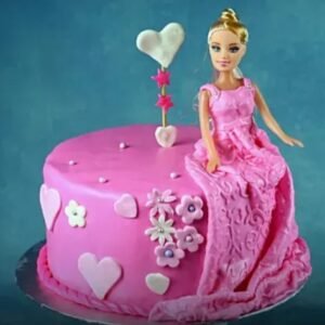 Charming Pink Barbie Fondant Cake adorned with vibrant decorations, ideal for birthdays and celebrations for Barbie enthusiasts.