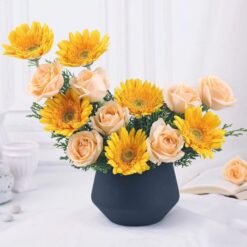 Radiant Rose and Gerbera Collection featuring a vibrant arrangement of roses and gerberas, perfect for celebrating love and happiness.