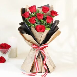 Scarlet Beauty Bouquet featuring a luxurious arrangement of vibrant red flowers, perfect for expressing love and admiration on special occasions.