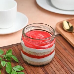 Strawberry Bliss Jar Cake - A delicious layered dessert in a jar featuring fresh strawberries and creamy cake, perfect for sweet indulgence.