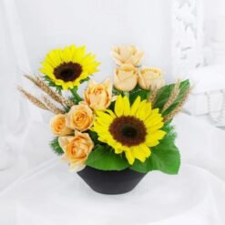 Sunlit Sunflower Serenity Bouquet featuring vibrant sunflowers, perfect for adding warmth, joy, and natural beauty to home decor or special occasions.