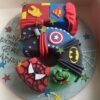 Colorful Superhero Number Cake, ideal for birthday celebrations, featuring vibrant designs and themed decorations to delight superhero fans.