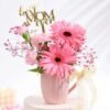 Sweet Petal Salute for Mother – a vibrant floral arrangement filled with colorful petals, designed to honor and celebrate mothers on special occasions.