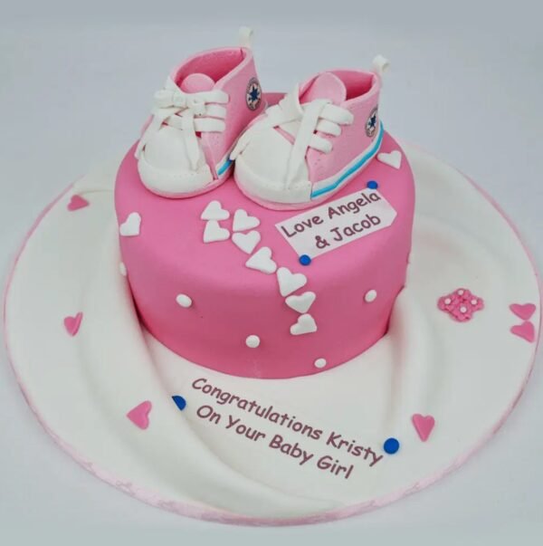 Pink Shoes It’s A Girl Cake adorned with cute pink shoe designs, perfect for celebrating the arrival of a baby girl.