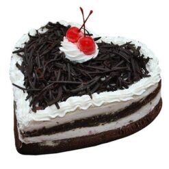 Sweetheart Black Forest Cake with layers of chocolate sponge, whipped cream, and cherries, heart-shaped and beautifully decorated for special occasions.