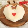 Velvet Heart Pinata Cake with red velvet exterior, heart-shaped design, and hidden surprise inside, ideal for special celebrations.