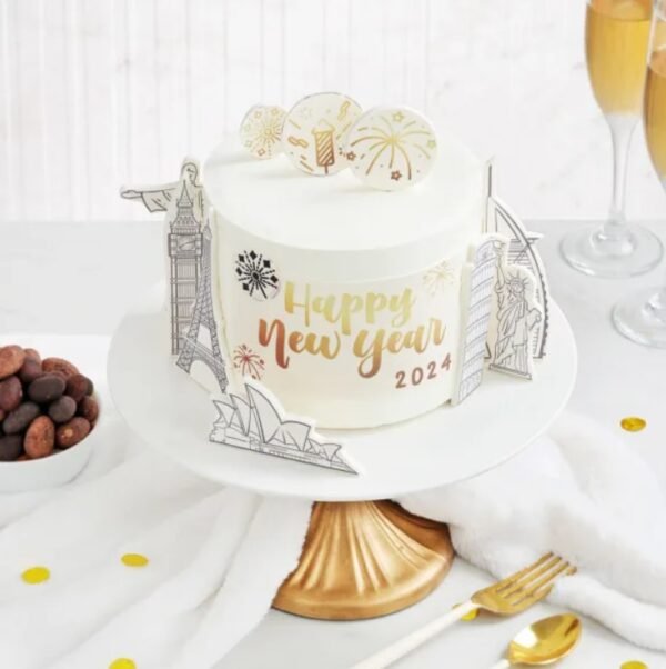 Cheers To The New Year Cake with celebratory decorations, perfect for toasting to the New Year with friends and family.