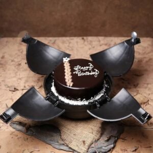 Choco Delight Bomb Cake featuring a chocolate shell that melts to reveal a decadent surprise, perfect for celebrations and special occasions.