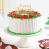 Christmas Rose Cream Cake decorated with elegant rose accents, featuring creamy layers, perfect for holiday gatherings and festive celebrations.