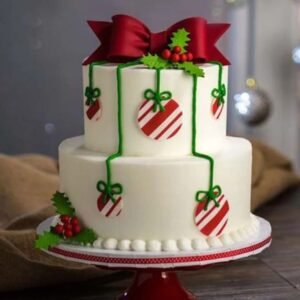 Christmas Tier Cake with festive layered design, adorned with holiday decorations, perfect for elegant Christmas celebrations and gatherings.