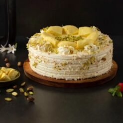 Delicious Rasmalai Cake with layers of soft cake and creamy rasmalai, perfect for festive celebrations and special occasions.