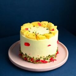 Floral Pistachio Rasmalai Bliss cake with layers of creamy rasmalai, pistachio flavor, and floral accents, perfect for special celebrations.