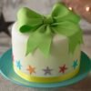 Elegant Fondant Grace Bow Cake, decorated with a delicate fondant bow, showcasing intricate craftsmanship and perfect for special celebrations.