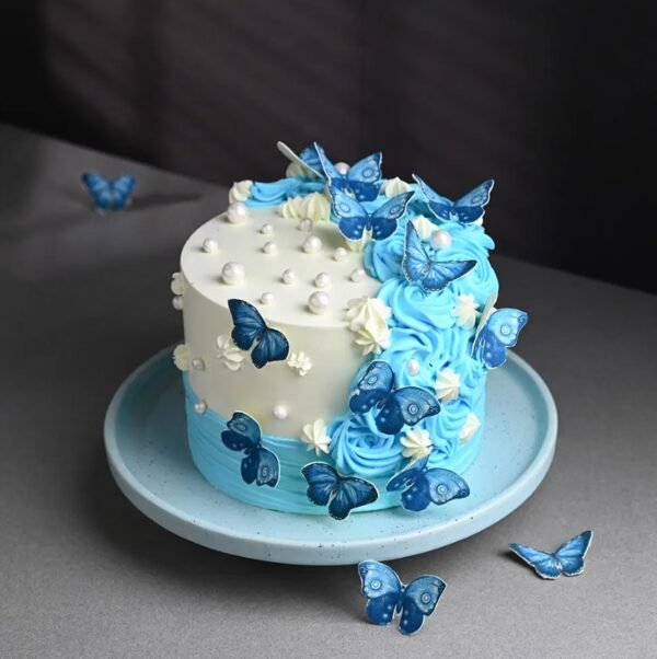 Graceful Butterfly Cake featuring intricate butterfly decorations, ideal for adding charm and elegance to birthdays, weddings, or any celebration.