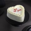 Heartfelt First Anniversary Cake featuring elegant decorations and heartfelt designs, perfect for marking the first year of love.