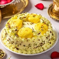 Irresistible Butterscotch Rasmalai Cake with layers of butterscotch-flavored cake and creamy rasmalai, ideal for special celebrations and dessert lovers.