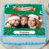 Joyful Christmas Tribute Cake adorned with festive decorations, perfect for celebrating Christmas and spreading holiday joy at gatherings.