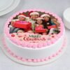 Joyous Christmas Photo Cake – a personalized cake decorated with festive photos, perfect for celebrating joyous holiday moments with family and friends.