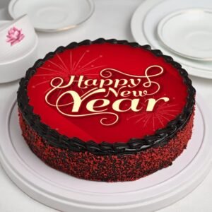 Red Velvet New Year Celebration Cake with creamy layers and festive decorations, perfect for welcoming the New Year in style.