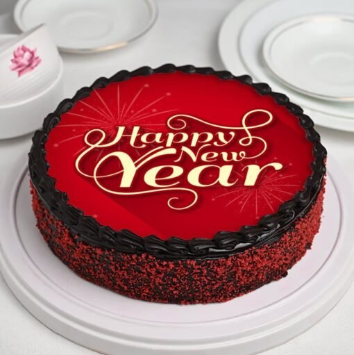 Red Velvet New Year Celebration Cake with creamy layers and festive decorations, perfect for welcoming the New Year in style.
