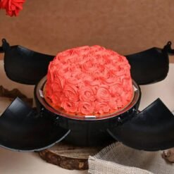 Red Velvet Roses Bomb Cake – a luxurious red velvet cake adorned with roses and a surprise-filled center for special occasions.