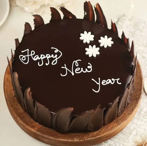 Rich Chocolate New Year Cake – a decadent chocolate cake crafted for New Year celebrations, bringing deep cocoa flavor to the festivities.