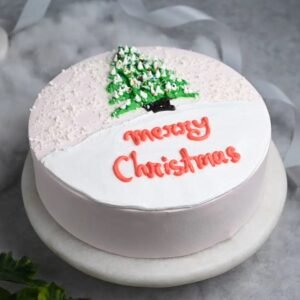 Round Chocolate Christmas Tree Cake – a festive round cake designed like a Christmas tree, perfect for holiday gatherings and celebrations.