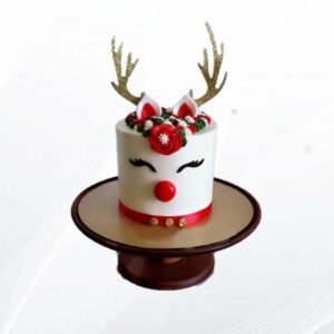 Silent Night Reindeer Cake with peaceful reindeer design and rich layers, perfect for elegant Christmas gatherings and holiday celebrations.