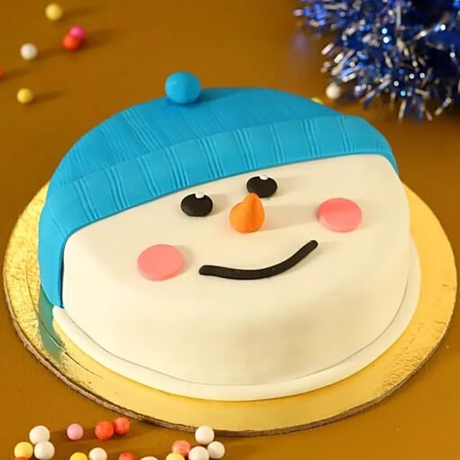 Snowman Truffle Bliss Cake featuring layers of rich chocolate and decorated with adorable snowman truffles, ideal for holiday festivities.