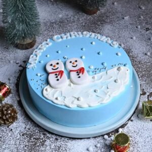 Snowmen Pineapple Christmas Cake – a festive cake decorated with cute snowman figures, combining pineapple flavor with a fun holiday design.