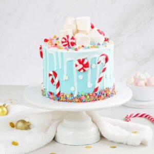 Snowy Christmas Magic Cake featuring creamy layers and snow-themed decorations, perfect for adding a magical touch to holiday celebrations.