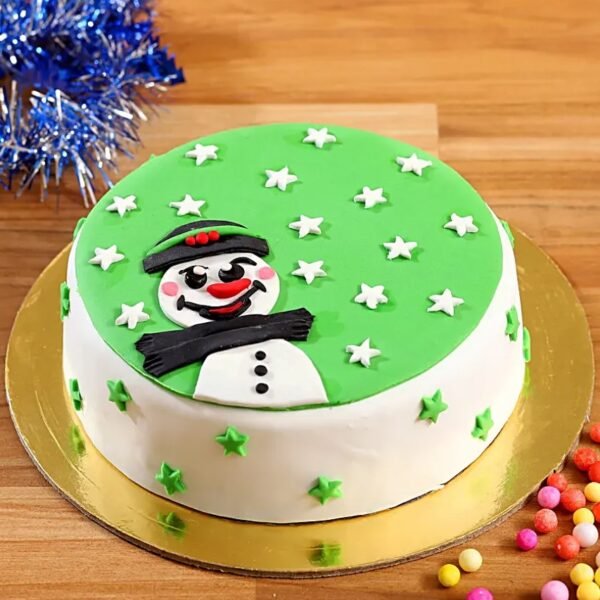 Starry Snowman Chocolate Cake adorned with charming snowman decorations and a starry theme, featuring rich layers of chocolate cake for winter festivities.